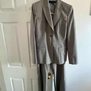 Women’s business pant suit size 8 the brand is Anne Klein light taupe grey